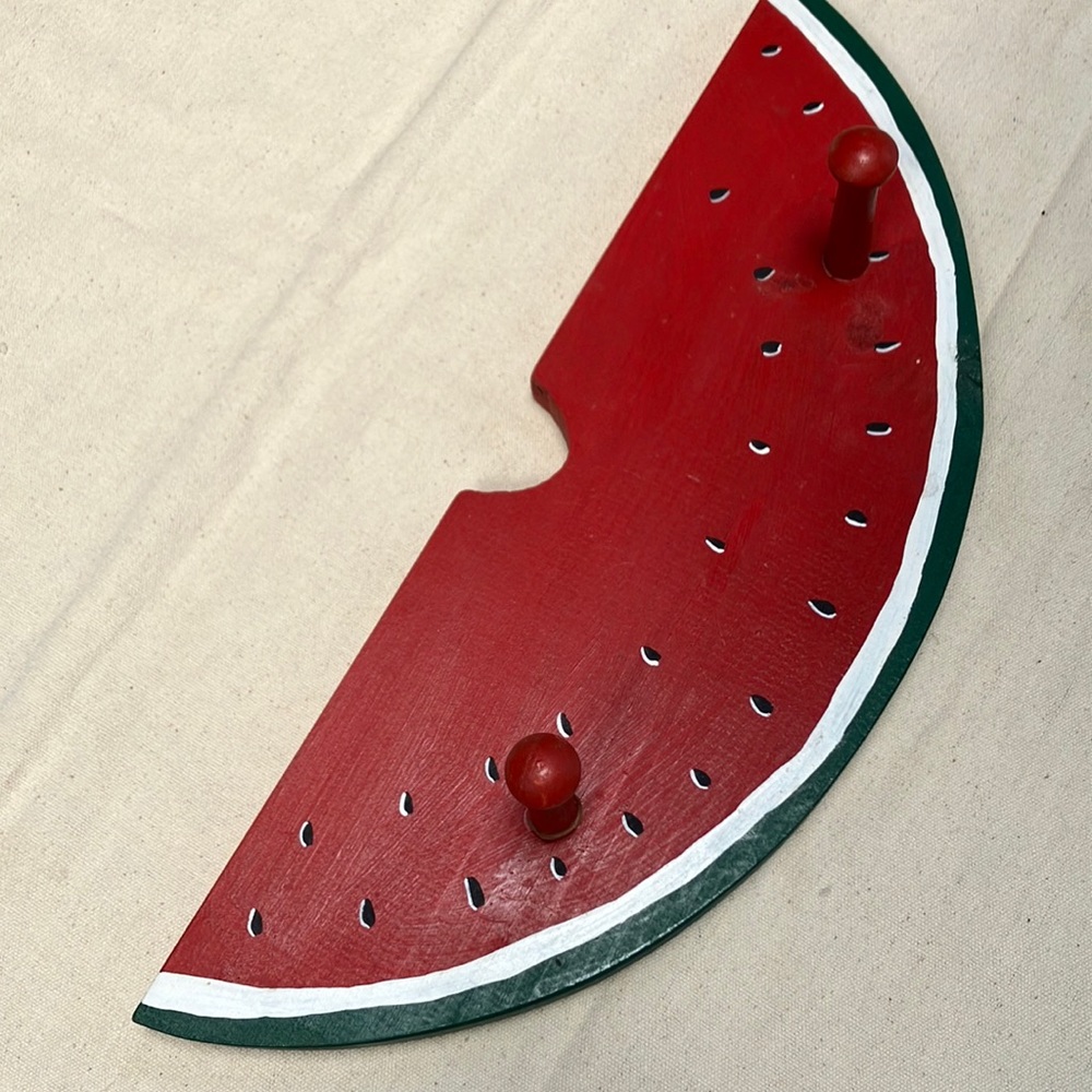 Watermelon wall hook, 18” long. 6.5 wide. 1” deep. Ready with hang tabs on back.